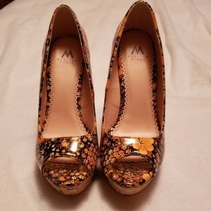 Flowered platform wedges.